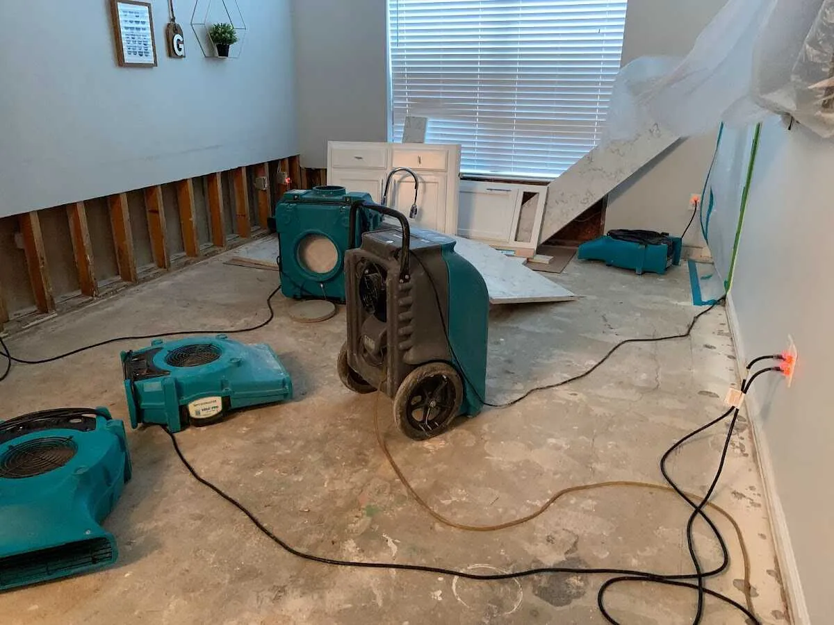 Dehumidifier in flood-cut room for Water Damage Restoration in Dunn